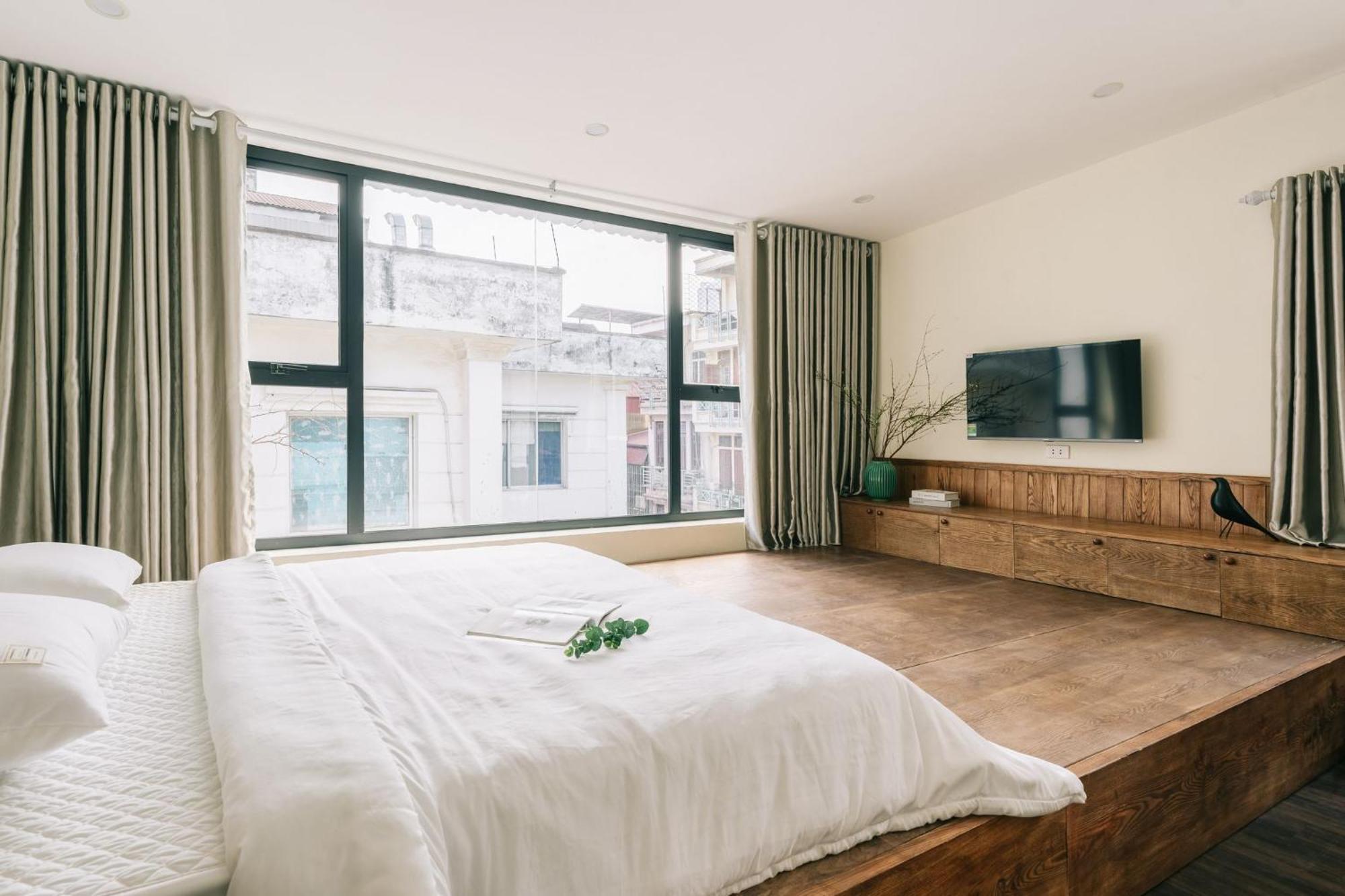Amber Glow - Cozy Retreat Near Thanh Cong Lake-free Laundry *